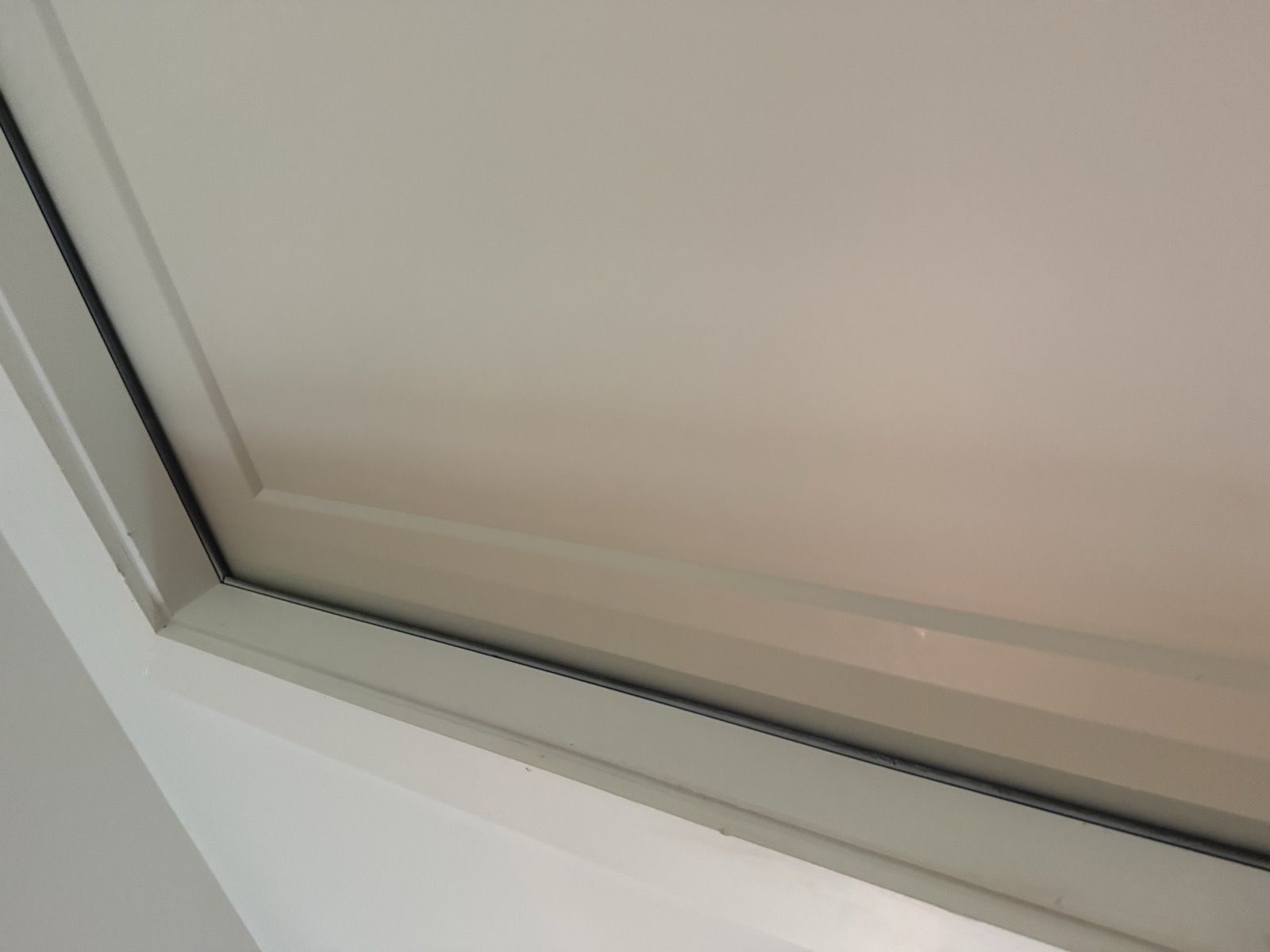 Gap at the top corner of a door and frame