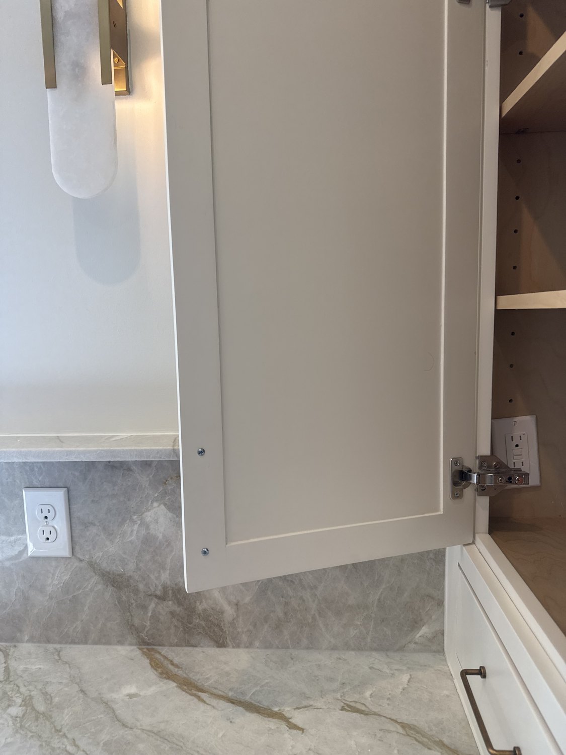 Kitchen cabinet outlets arcing / improperly installed